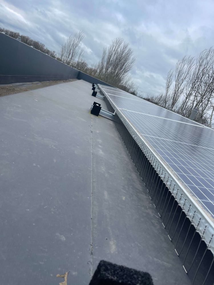 Solar panels along a flat roof