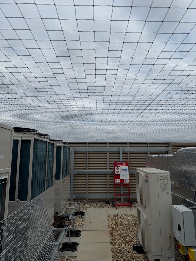 Rooftop plant area covered by bird netting
